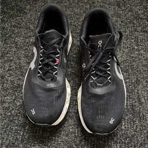 On Running Black and White Sneakers